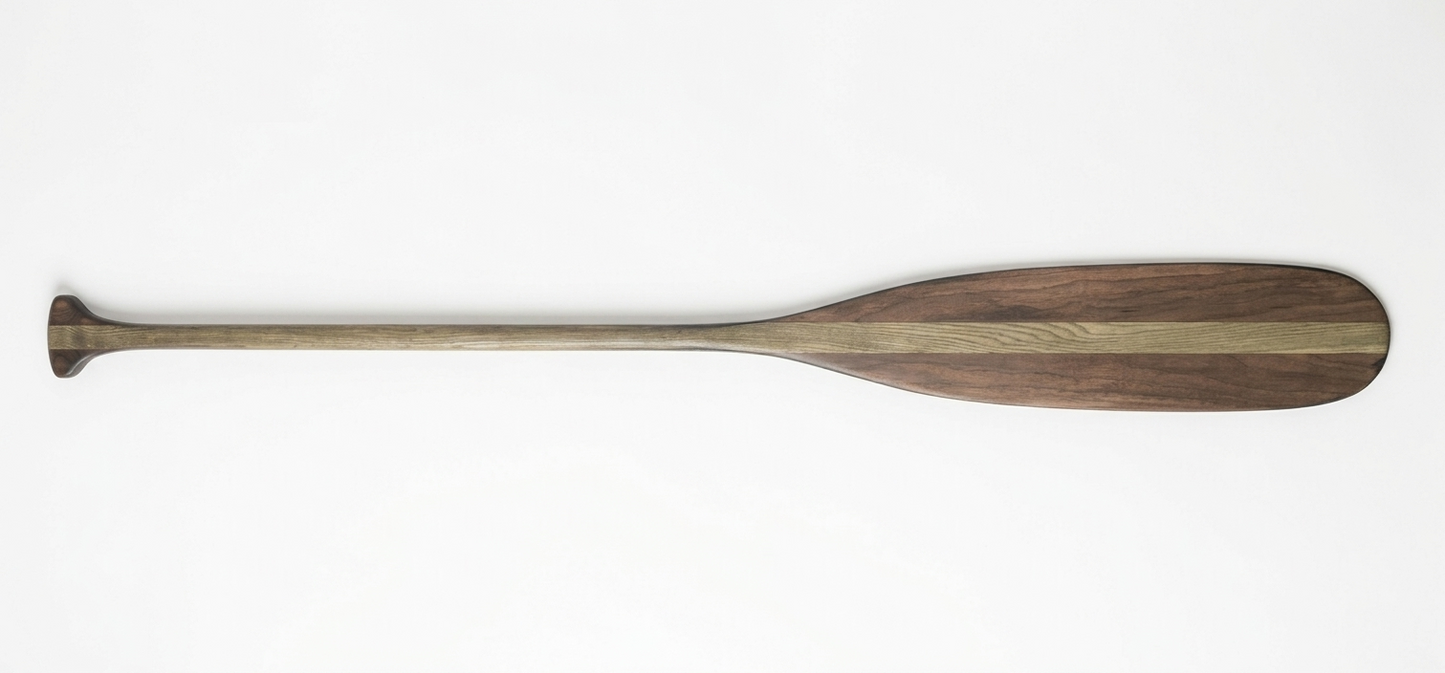 Wooden paddle on a white background
