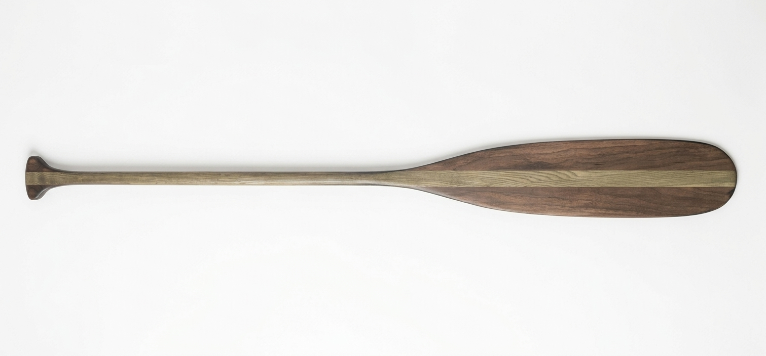 Wooden paddle on a white background